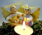 Δύο άγγελοι με ένα κερί